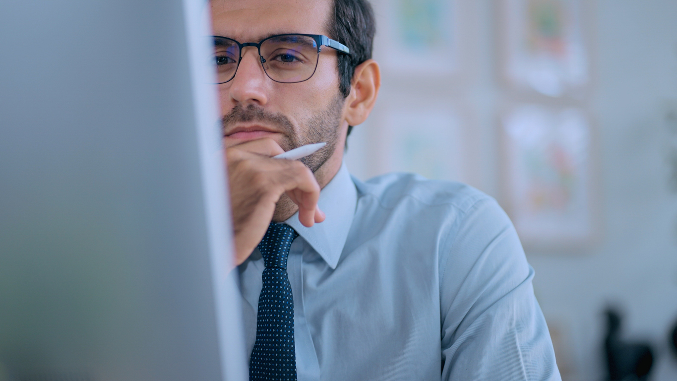 Man Looking At Laptop Economic Commentary July 25