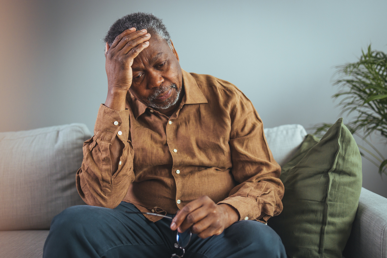 Worried Man On Sofa